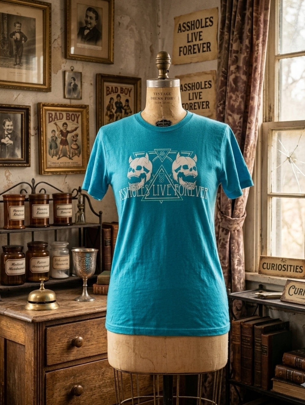 Assholes Live Forever Graphic Tee – Women’s Small – Turquoise Skull Graphic